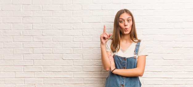 Young hipster woman having a great idea