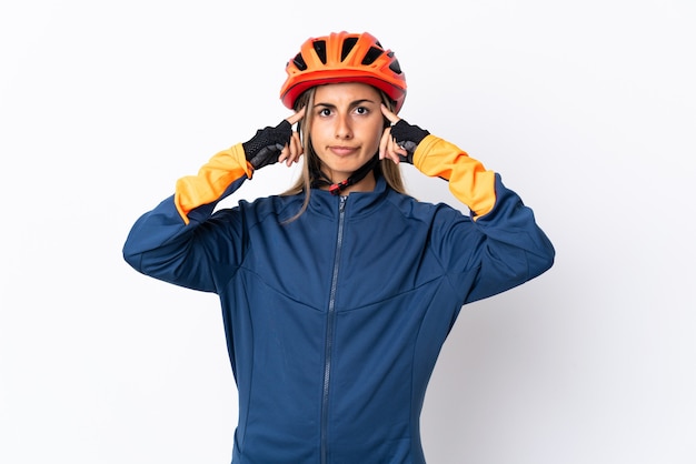 Young hispanic cyclist woman isolated