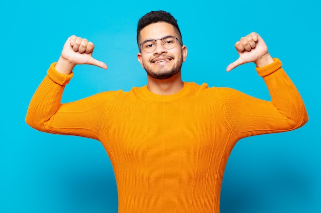 Young hispanic man happy expression