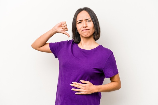 Young hispanic pregnant woman isolated on white background feels proud and self confident example to follow