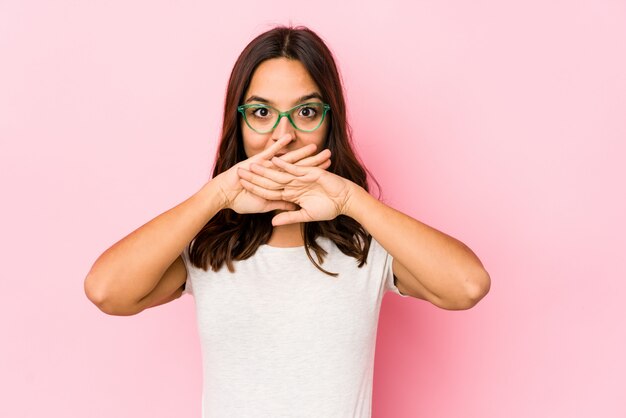 Young hispanic woman doing a denial gesture