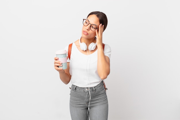 young hispanic woman feeling bored, frustrated and sleepy after a tiresome. student concept