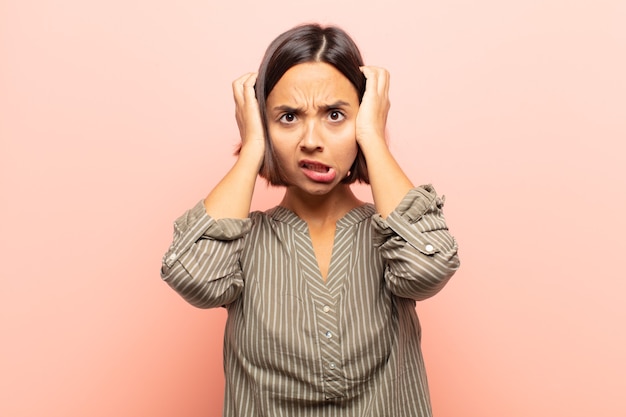 Young hispanic woman feeling frustrated and annoyed, sick and tired of failure