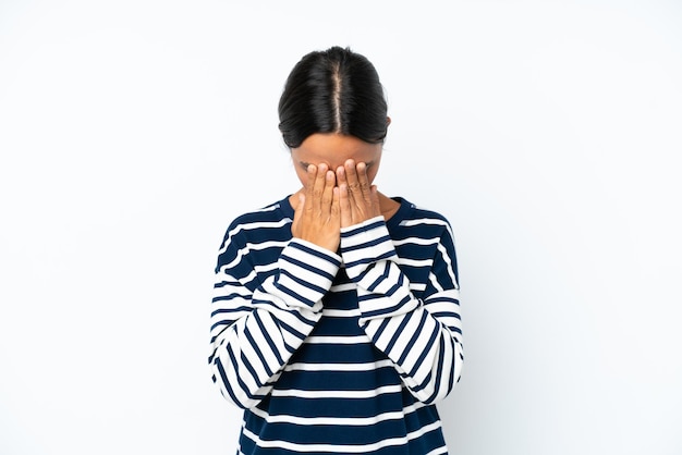 Young hispanic woman isolated on white background with tired and sick expression