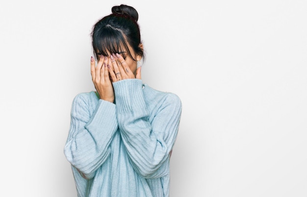 Young hispanic woman wearing casual clothes rubbing eyes for fatigue and headache sleepy and tired expression vision problem