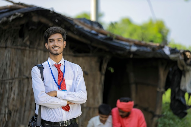 Young indian banker visit to farmer at home