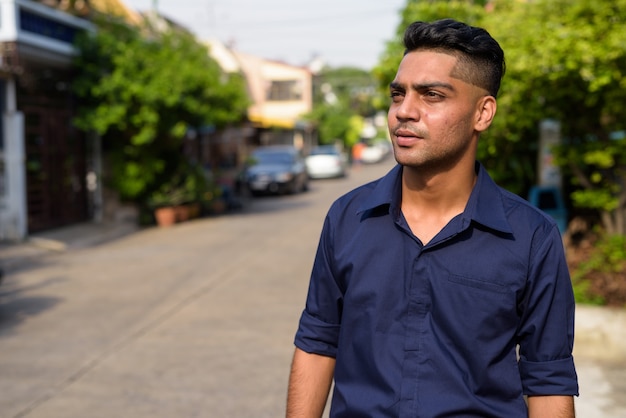 Young Indian businessman in the streets outdoors