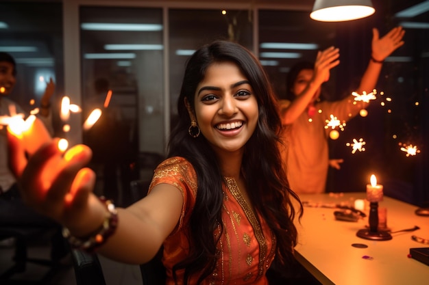 A young Indian businesswoman is enjoying Diwali celebrations in her office