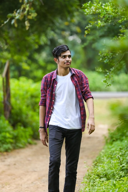 Young indian college student showing expression.