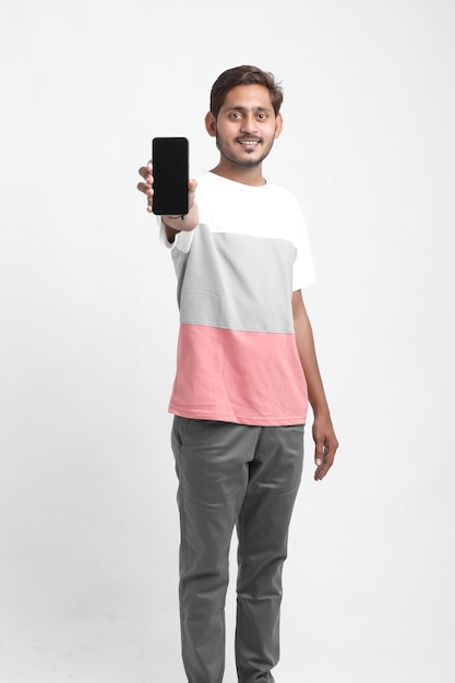 Young Indian college student showing smartphone Screen