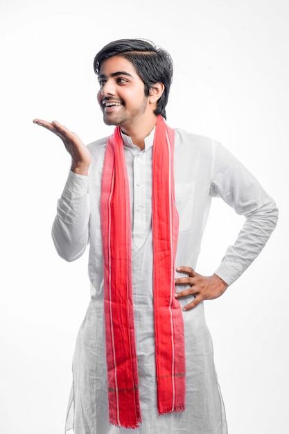 Young indian farmer giving expression on white background