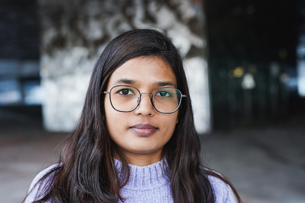 Young indian girl looking on camera