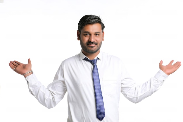 Young indian man showing expression on white background