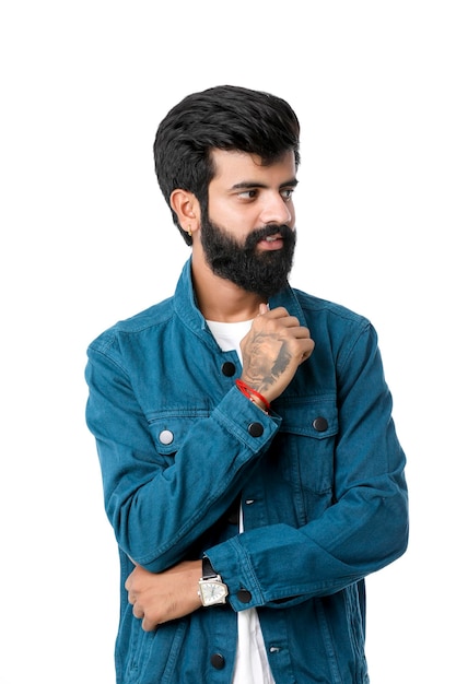 Young indian man wear jacket and giving expression over white background