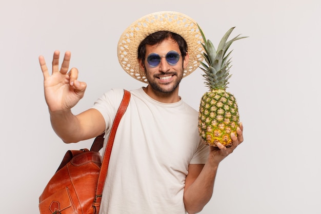 Young indian traveler man happy expression