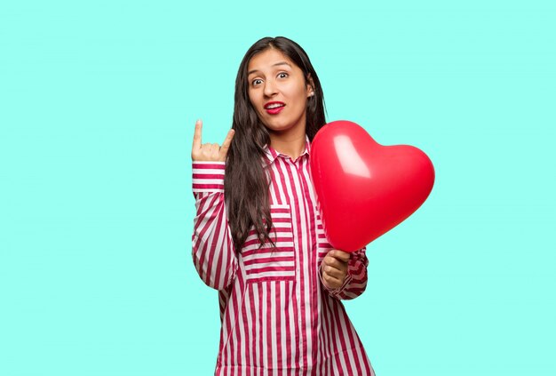 Young indian woman celebrating valentines day