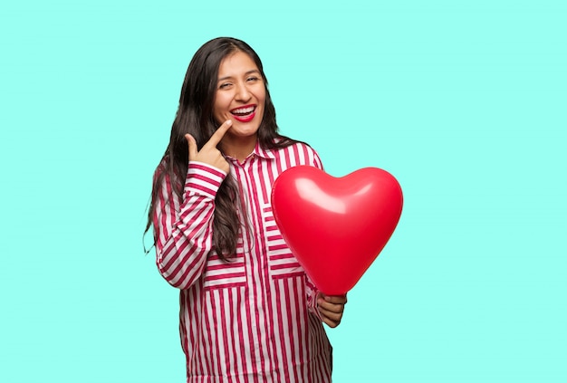 Young indian woman celebrating valentines day