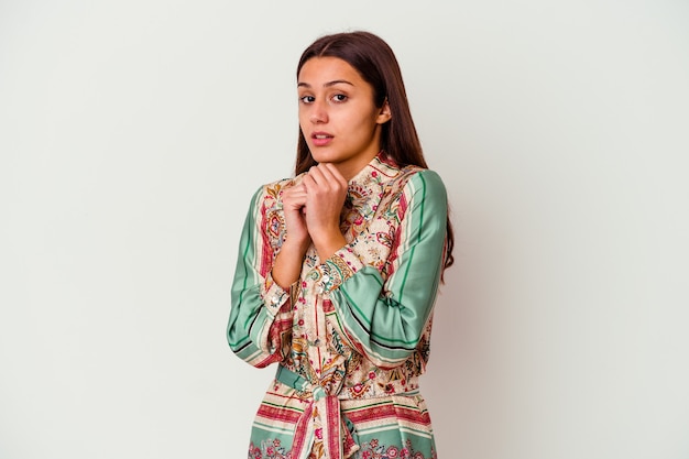 Young Indian woman isolated on white scared and afraid.