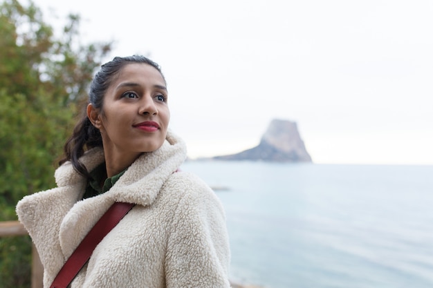 Young indian woman on nature place