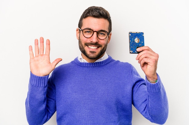 Young informatics caucasian man isolated on white background smiling cheerful showing number five with fingers