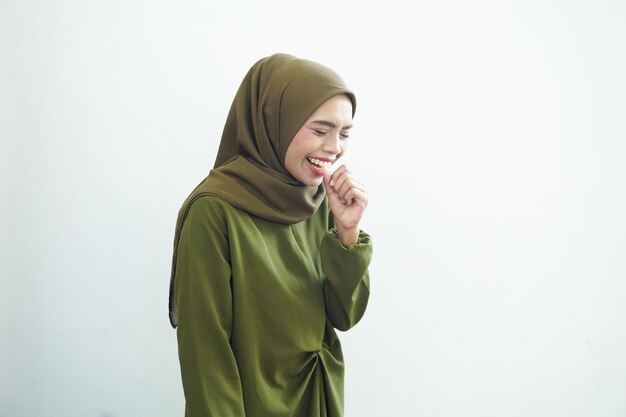 Young islamic woman over isolated white background having cough and feeling bad