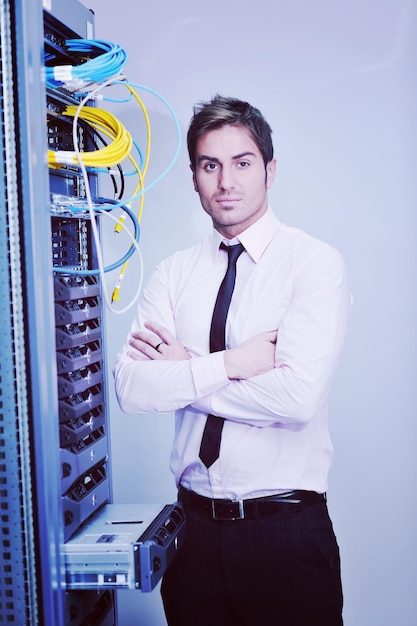 young it engineer in datacenter server room