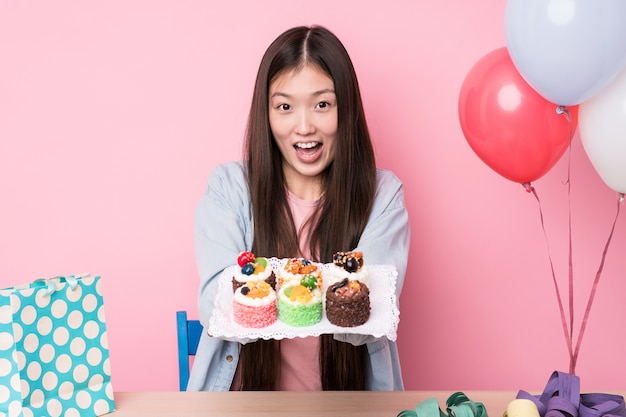 Young japanese woman preparing a birthday party