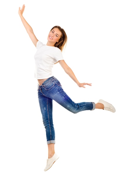 Young jumping girl isolated on a white background