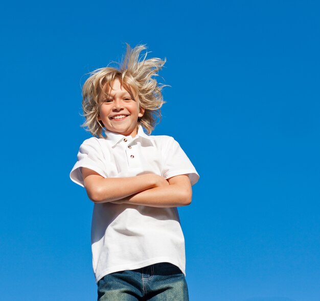 Young kid Jumping in the air