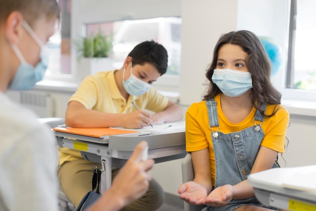 Young kids with masks