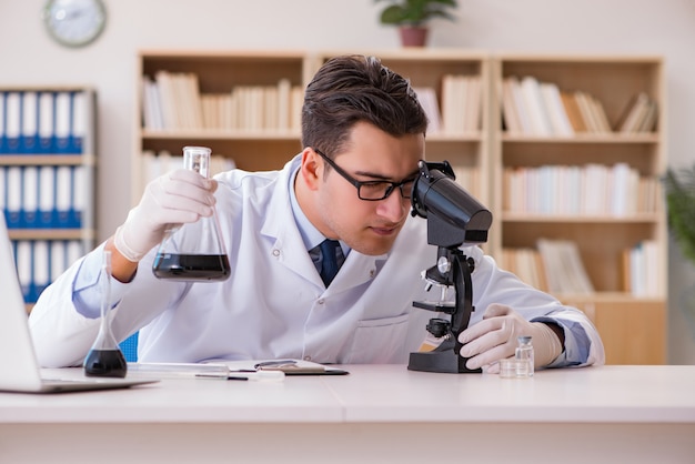 Young lab assistan working in the laboratory