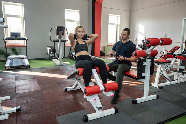 The young lady came to the gym to get in shape and get rid of cellulite to a qualified trainer