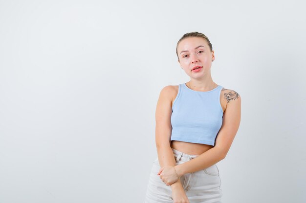 young lady is standing calm on white background