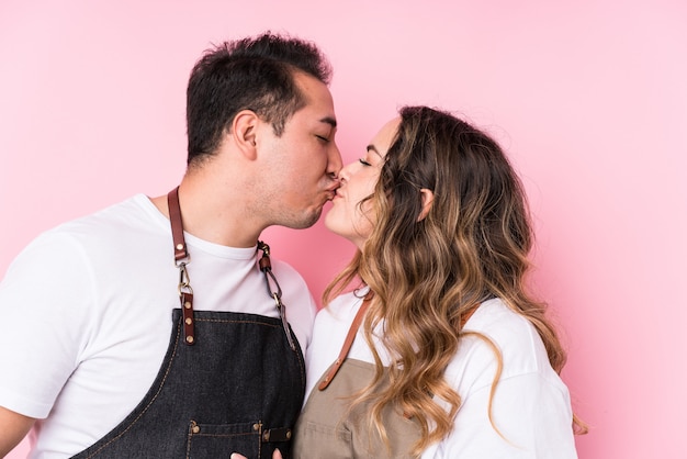 Young latin gardeners in love couple