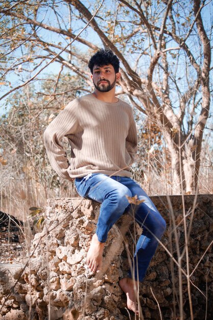 A young latin man in nature