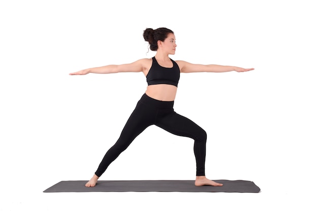 Photo young latin woman doing yoga pose.