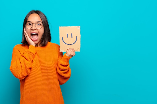 Young latin woman happy concept