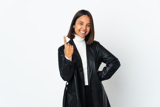 Young latin woman isolated on white background doing coming gesture