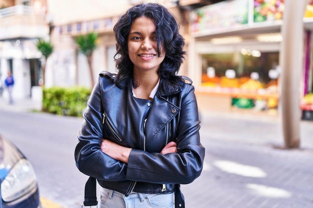 Young latin woman  at street