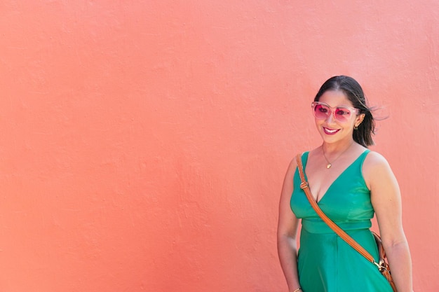 Young Latin Woman Walking On The Street On A Sunny Day.