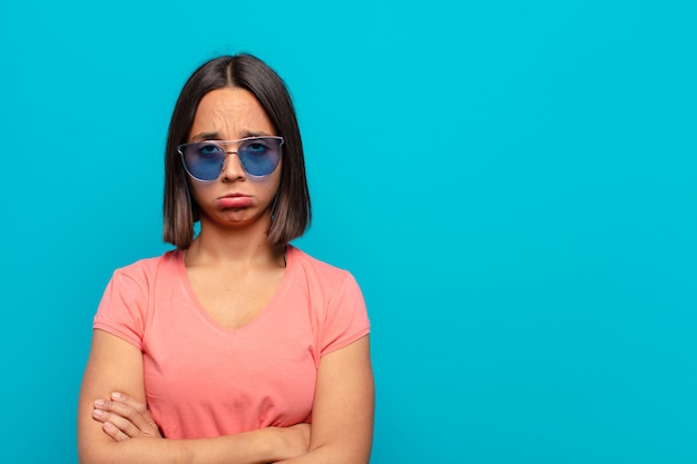 Young latin woman with sun glasses