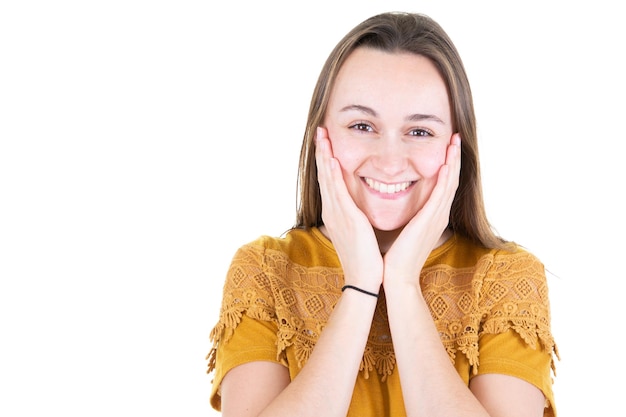Young laughing woman against isolated white background