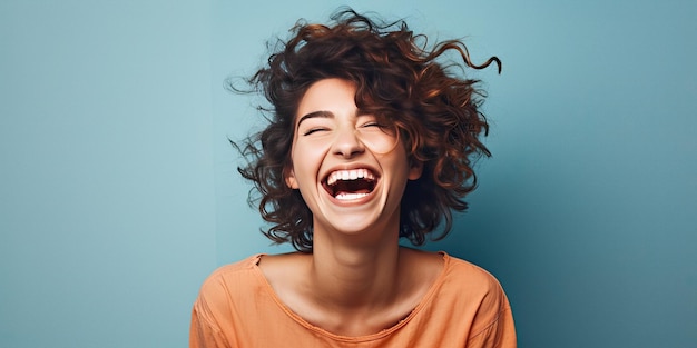 Young laughing woman with funny facial expressions