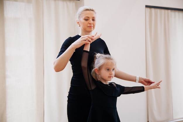 Young learners dancing with their choreography coach in the studio Activity concept