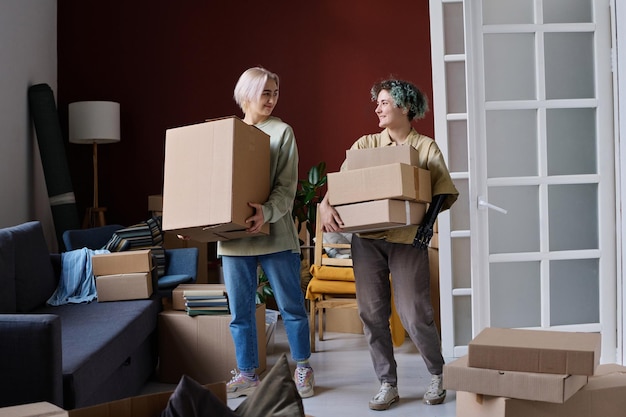 young lesbian couple moving to new apartment