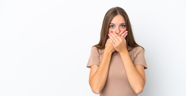 Young Lithuanian woman isolated on white background covering mouth with hands