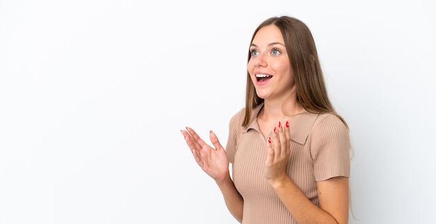 Young Lithuanian woman isolated on white background with surprise facial expression