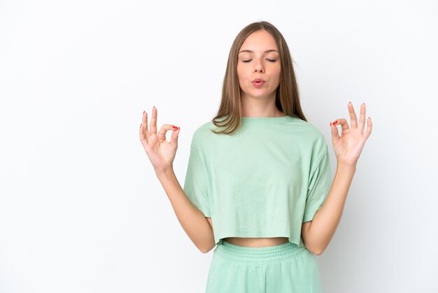 Young Lithuanian woman isolated on white background in zen pose