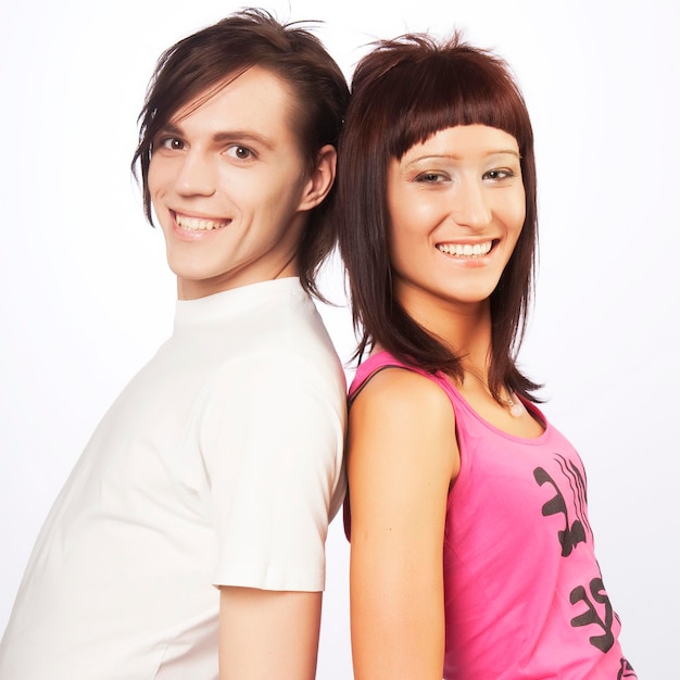 Young love couple smiling Over white background