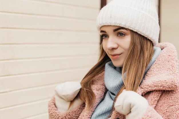 Young lovely pretty woman standing street in winter holiday